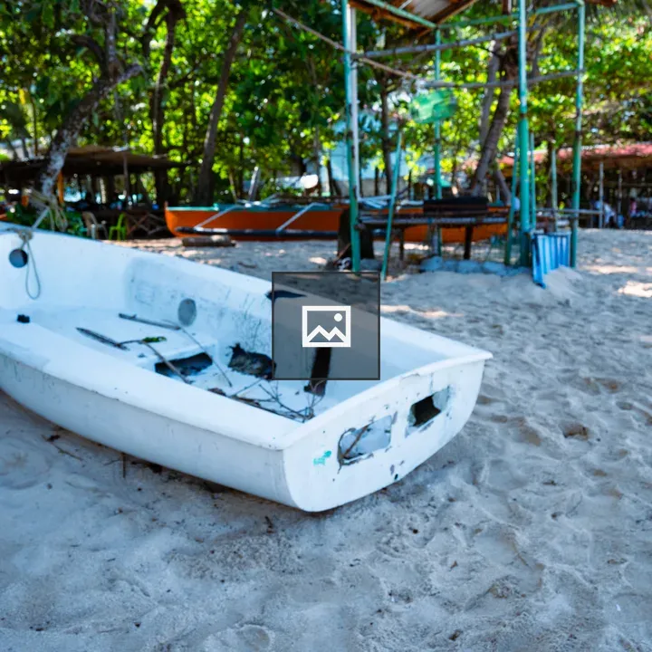 Abandoned white boat