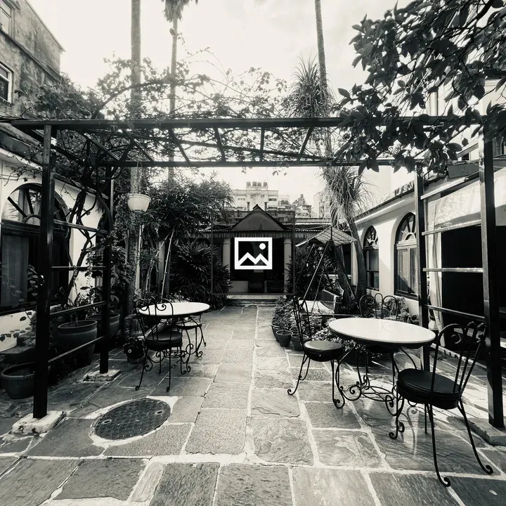 Outdoor courtyard with iron chairs