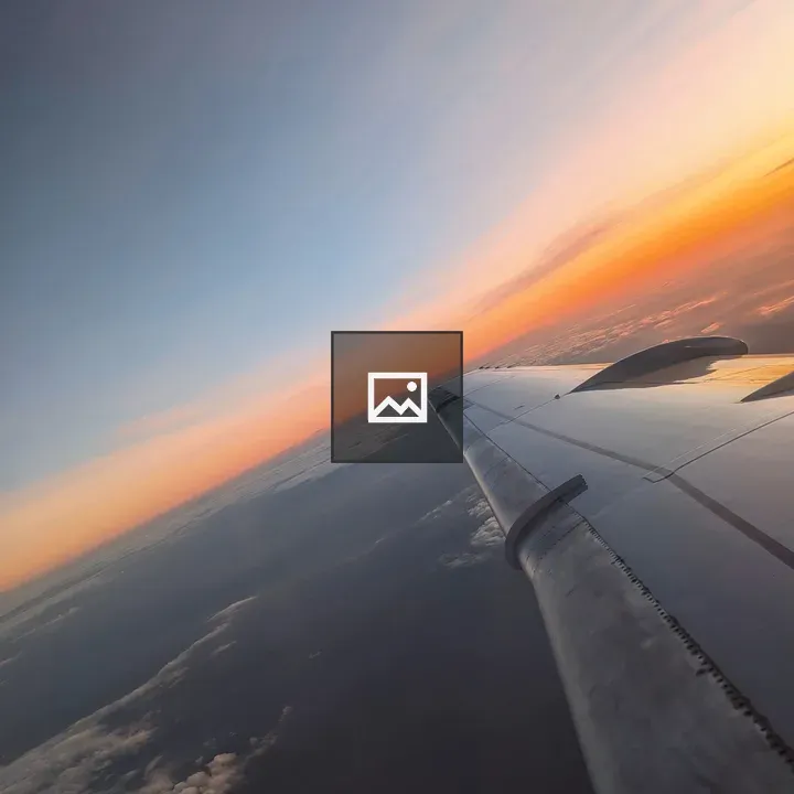 Airplane Wing at Sunset