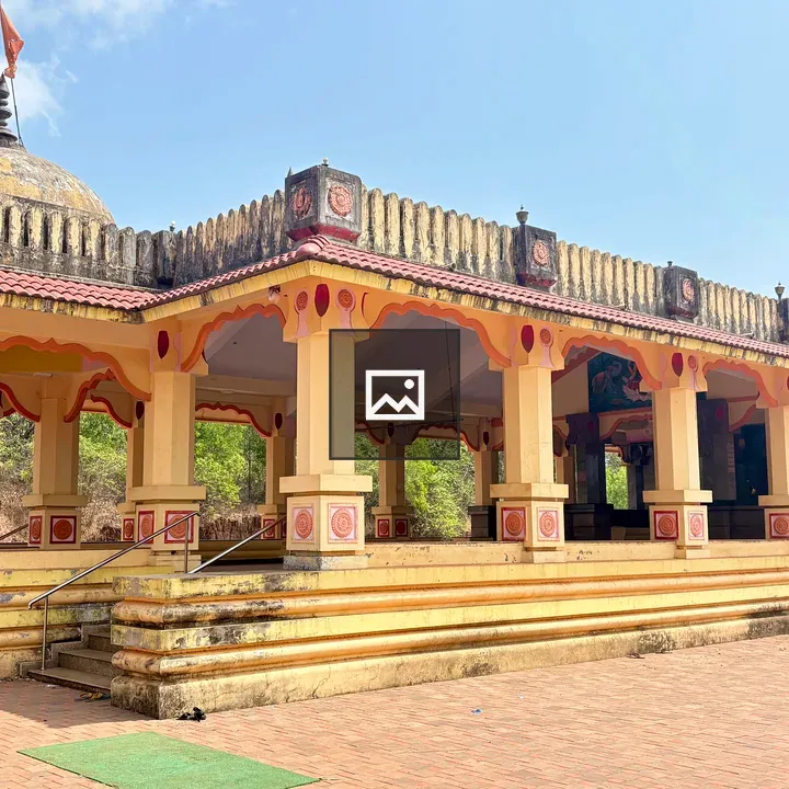 Indian temple with yellow facade