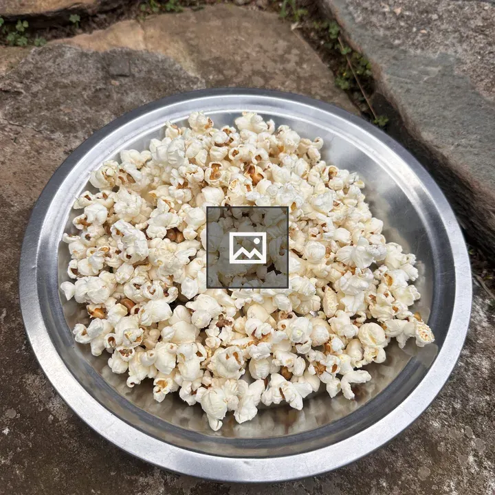 Popcorn in a metal bowl