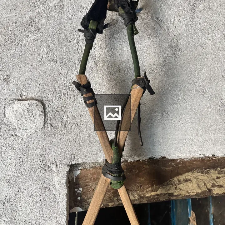 Slingshot on White Wall