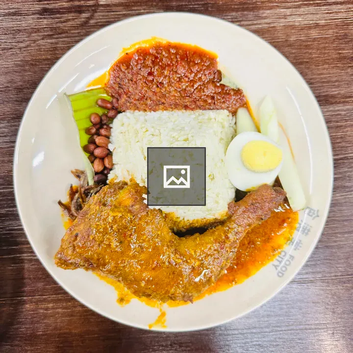 Plate of white rice and chicken