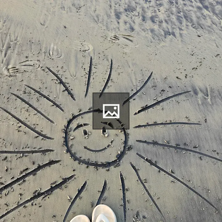 White flip-flops on beach