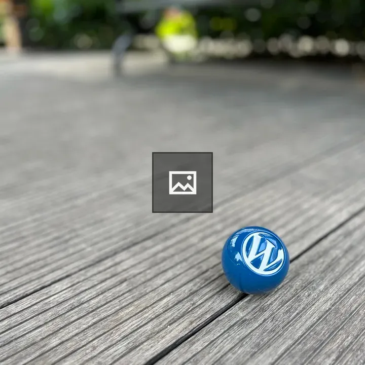 Blue Ball on Wood Floor