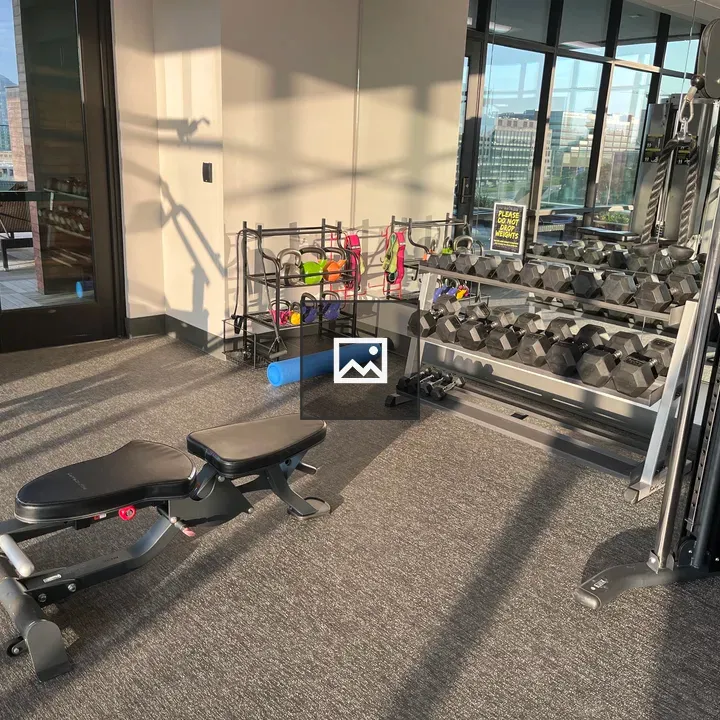 Workout equipment in gym setting