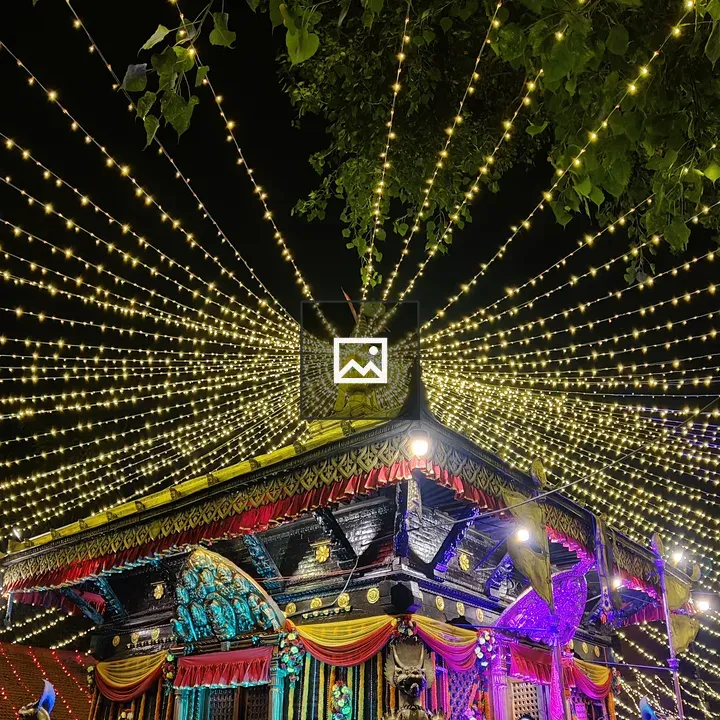 Temple illuminated with colorful lights