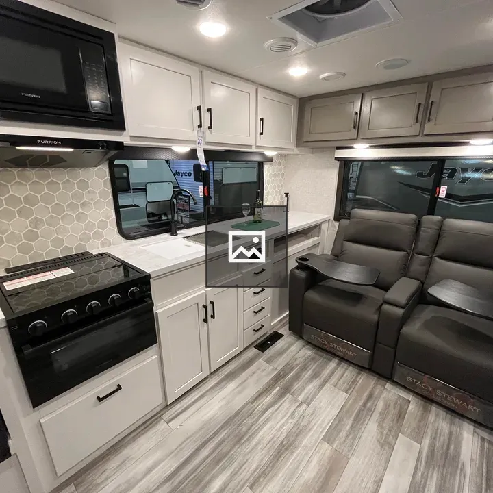 Kitchen and recliners in RV interior