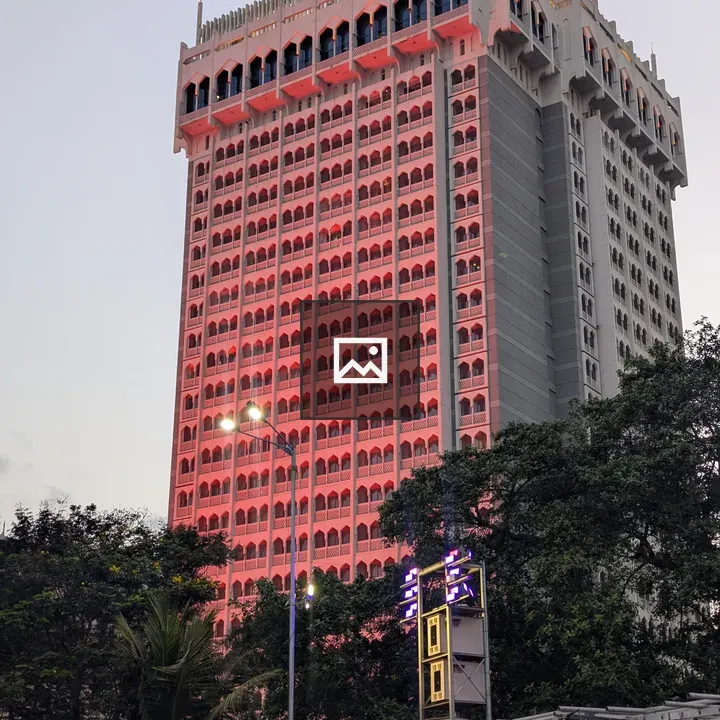 Tall hotel tower at dusk