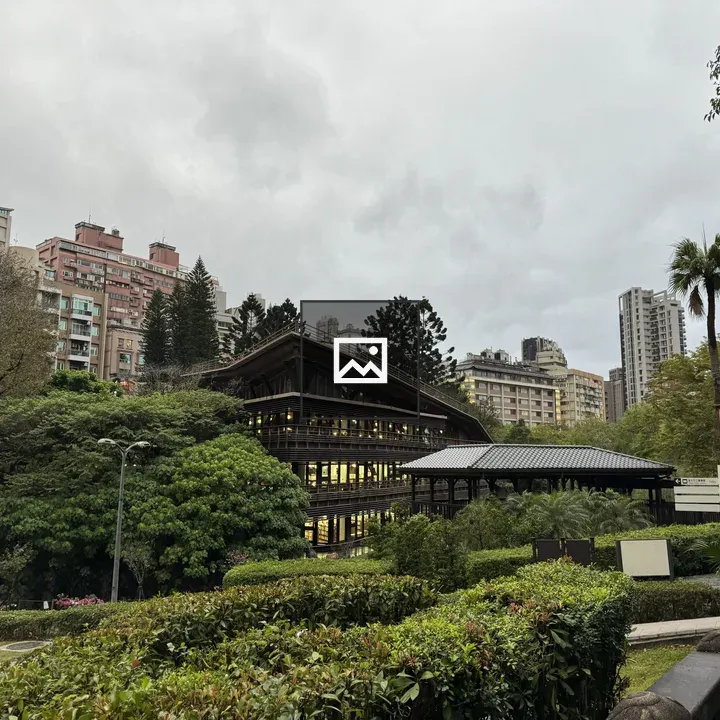 Modern wooden building with greenery