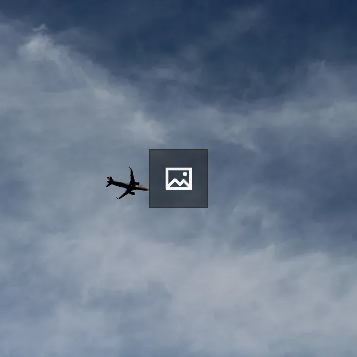 Silhouette of an airplane in the sky