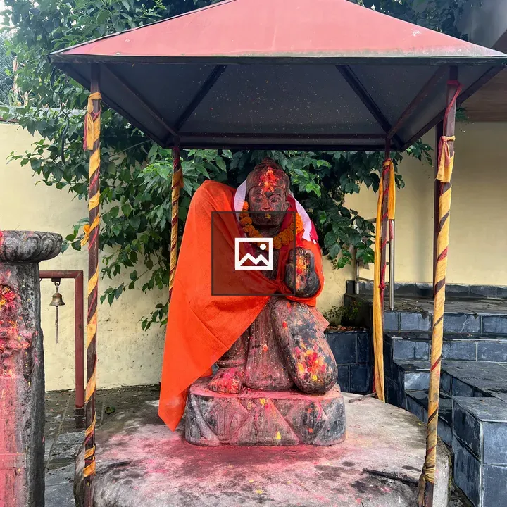 Hanuman statue with orange cloth