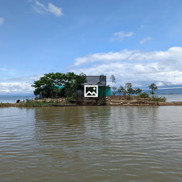 Small house by water in Sylhet