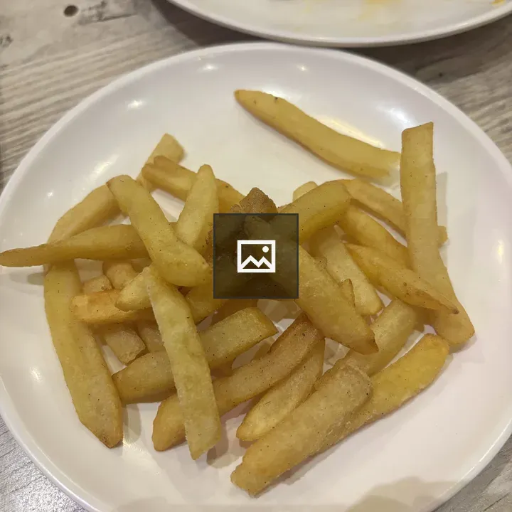 French fries on a white plate