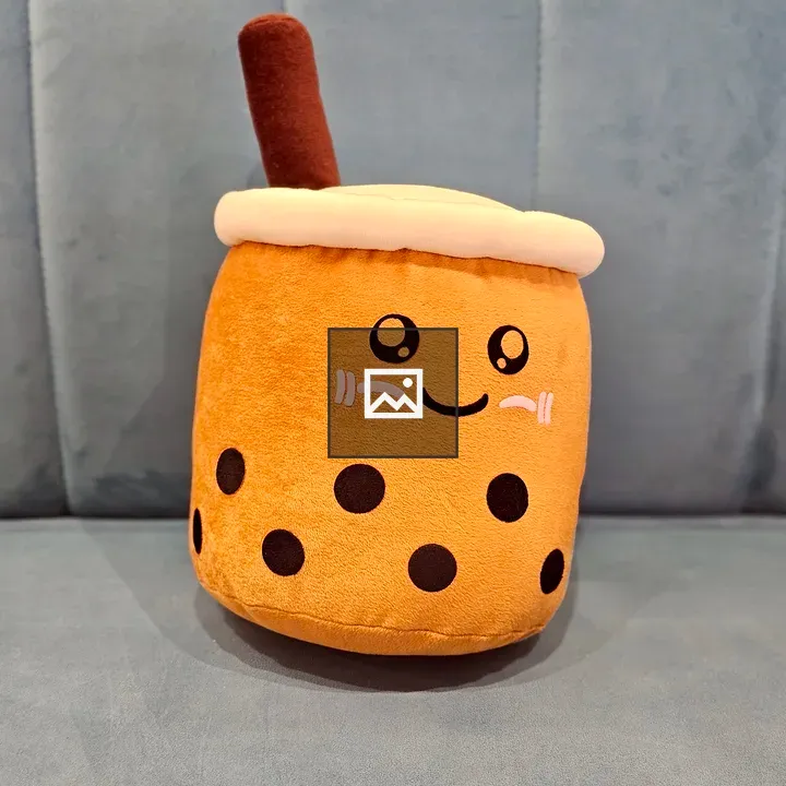 Bubble tea plush toy on sofa