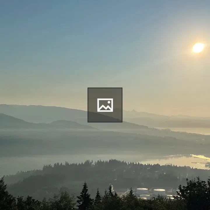 Hazy morning over BC water and hills