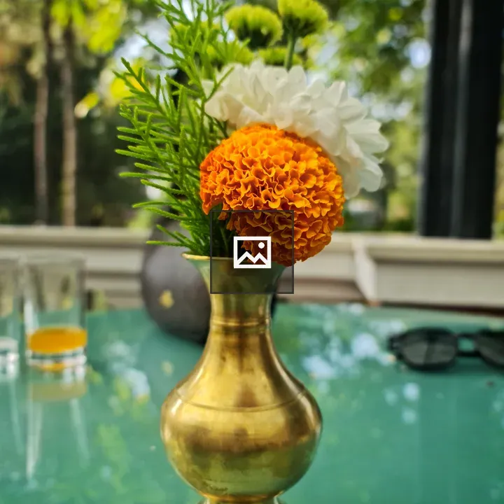 Small traditional pot with flower