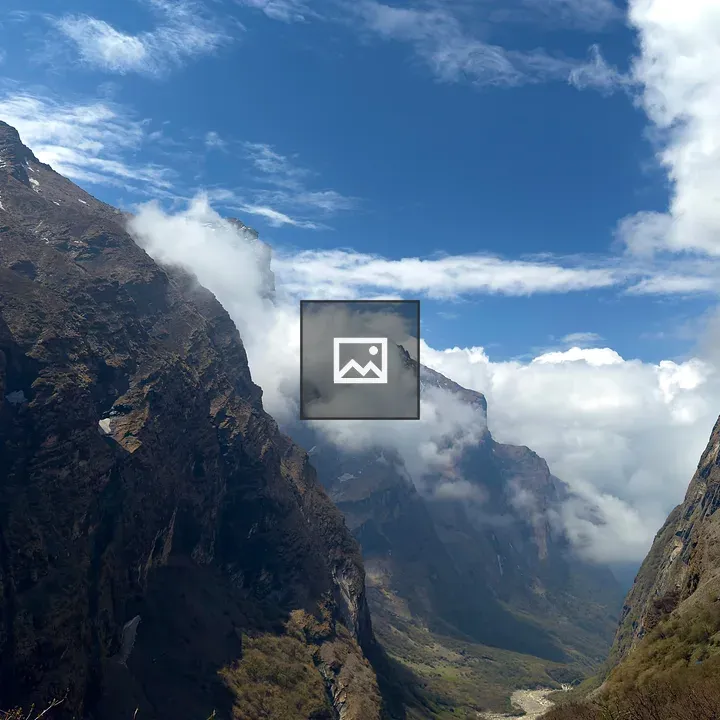 Mountain valley with blue sky