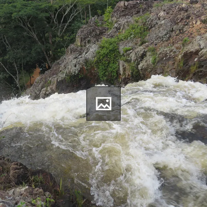 Waterfall on rocky slope