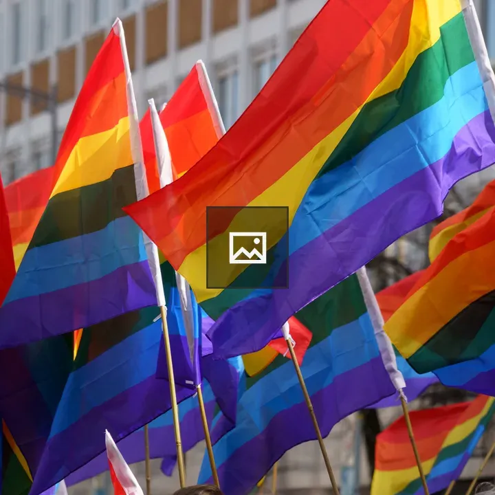 Pride Flags Over City Scene