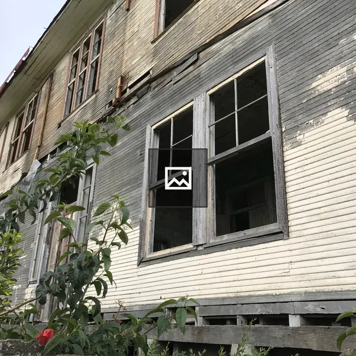 Old wooden house with weathered walls