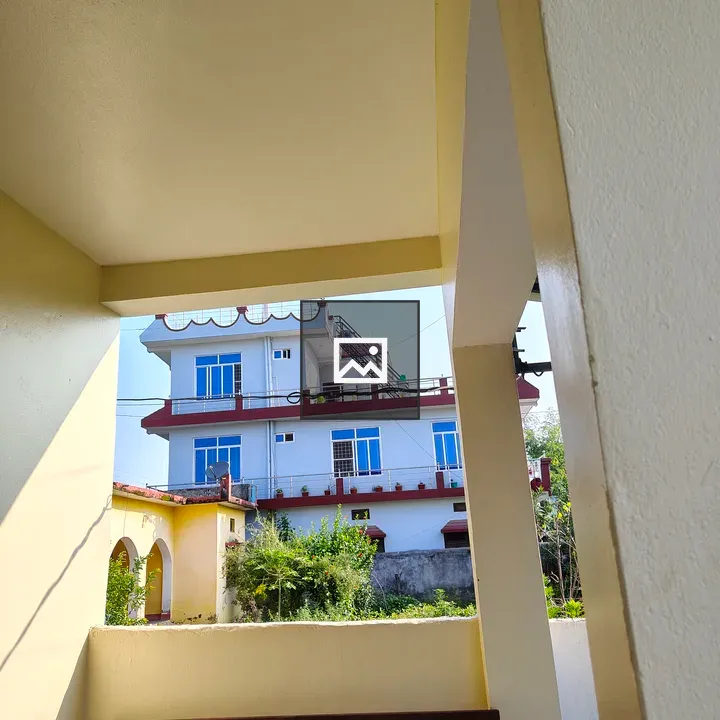 Porch View with Bench and Yellow Wall