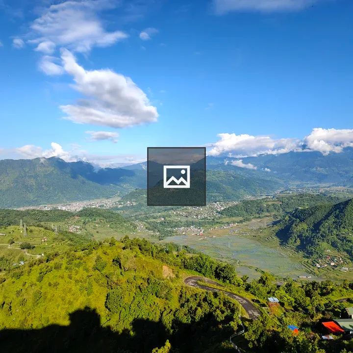 Panorama of green hills and blue sky