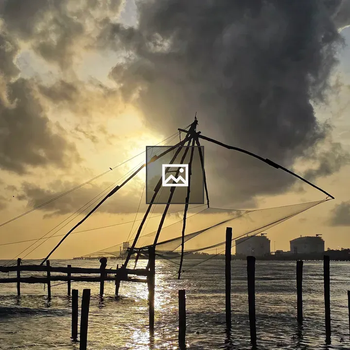 Chinese fishing nets at sunset Fort Kochi