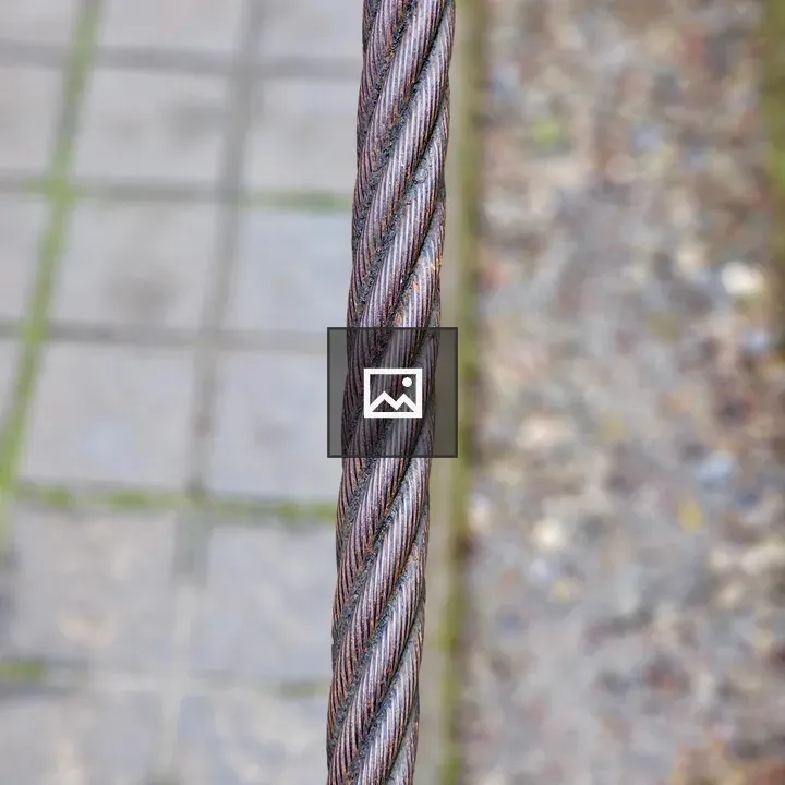 Thick twisted steel cable close-up