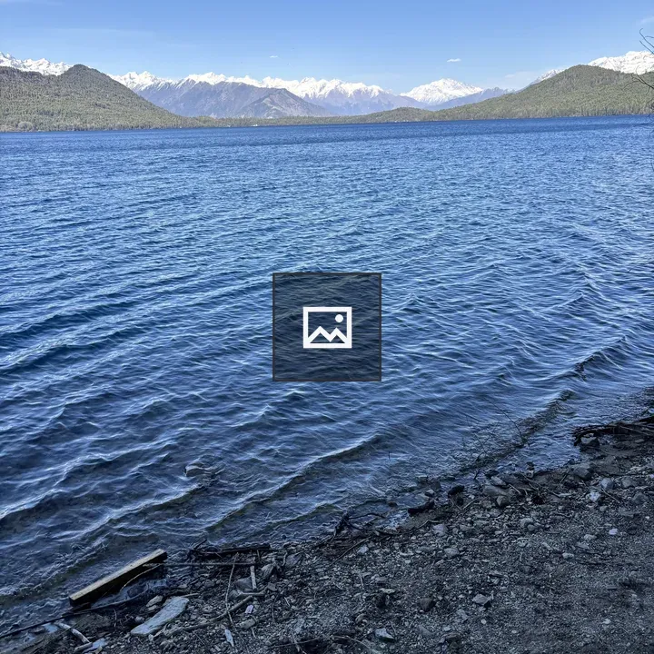 Lakeside Scene with Mountains