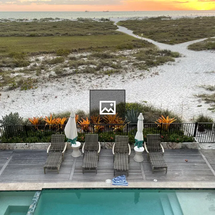 Sunset Over Pool and Beach
