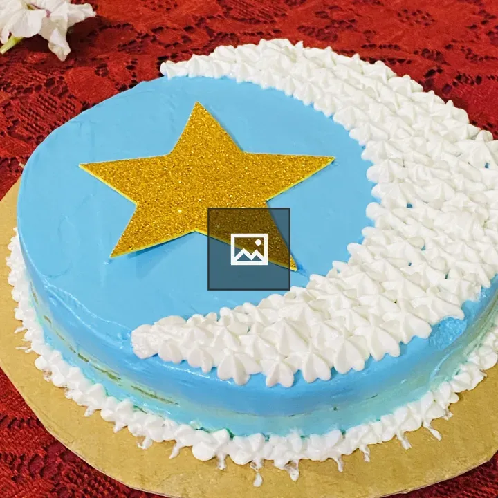 Round cake with blue frosting