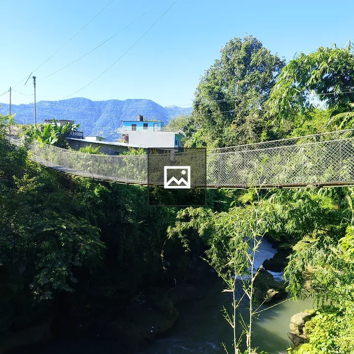 Suspension bridge over river