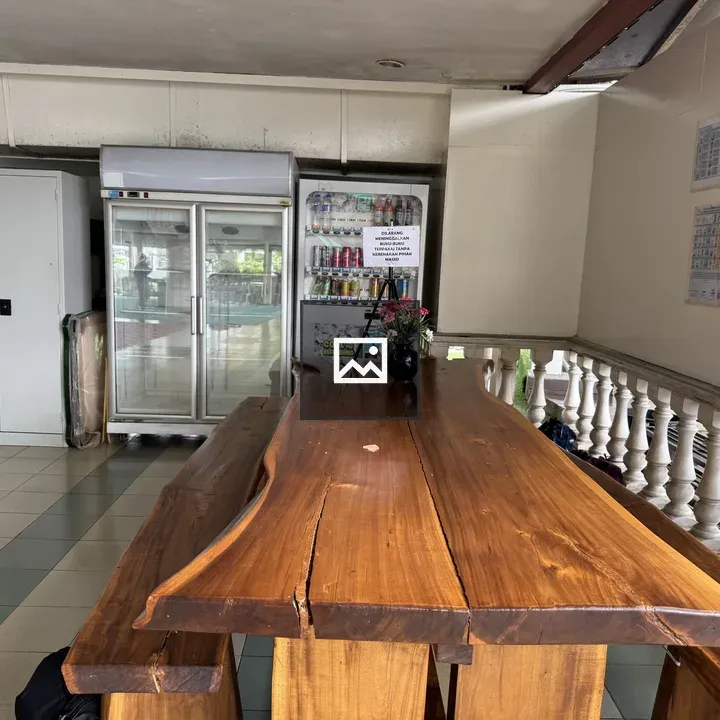 Wooden Table with Flowers in Open Kitchen