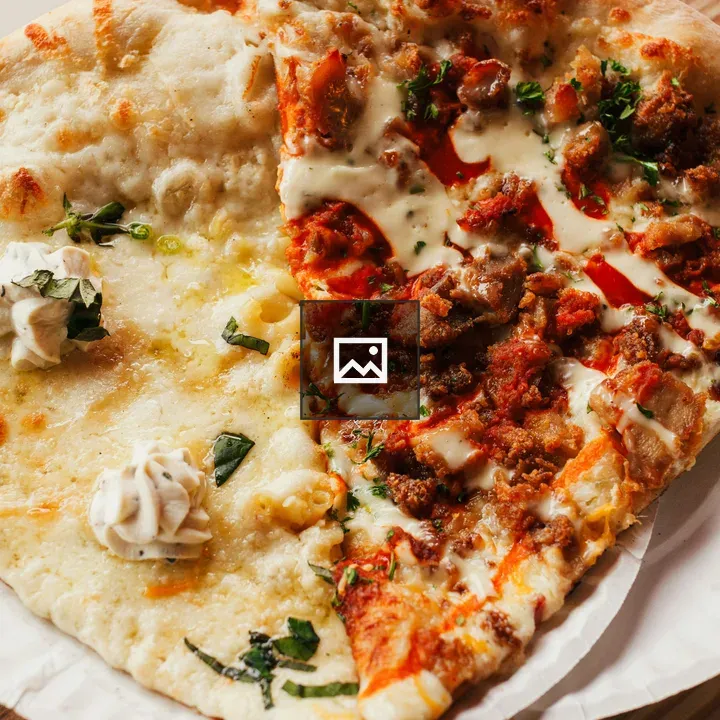 Pizza slices on paper plate