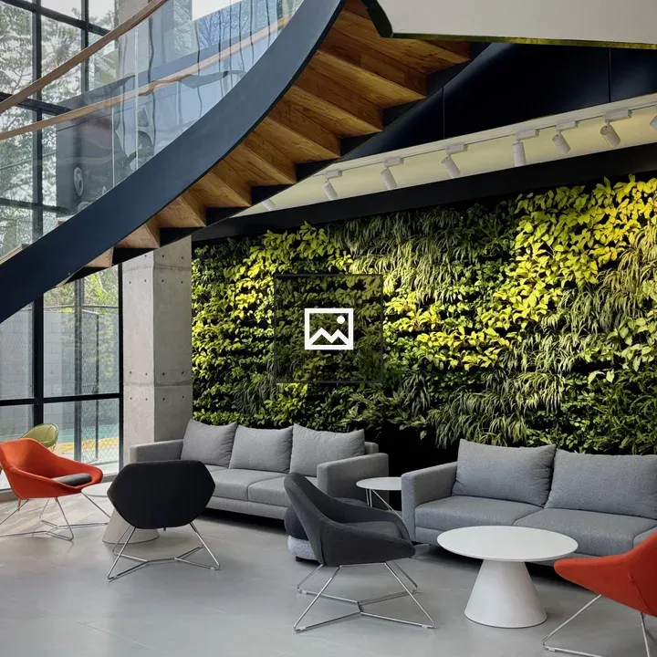 Modern lounge area with sofa and chairs