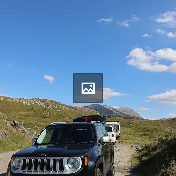 Black Jeep on Gravel Road
