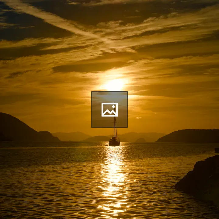Boat silhouette at sunset