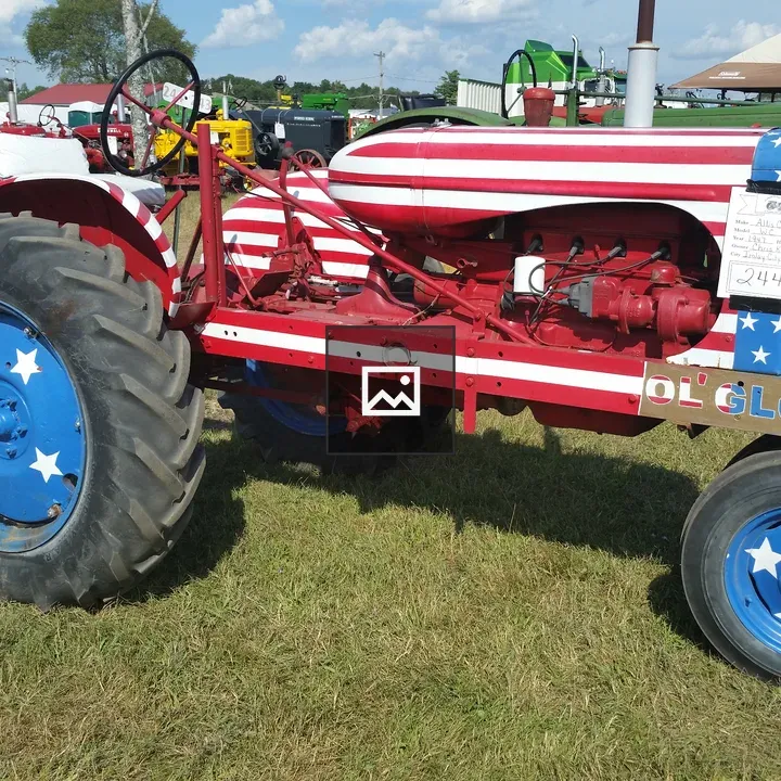 Red white and blue tractor