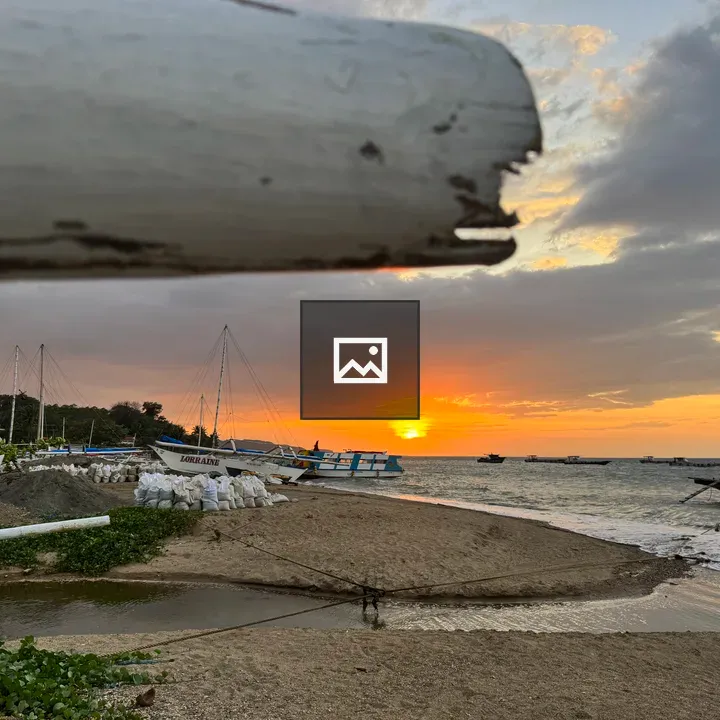 Sunset Over Harbor with Boats