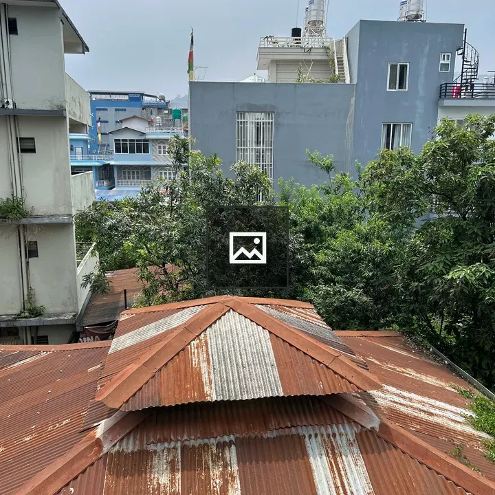 View of Corrugated Roof and Buildings