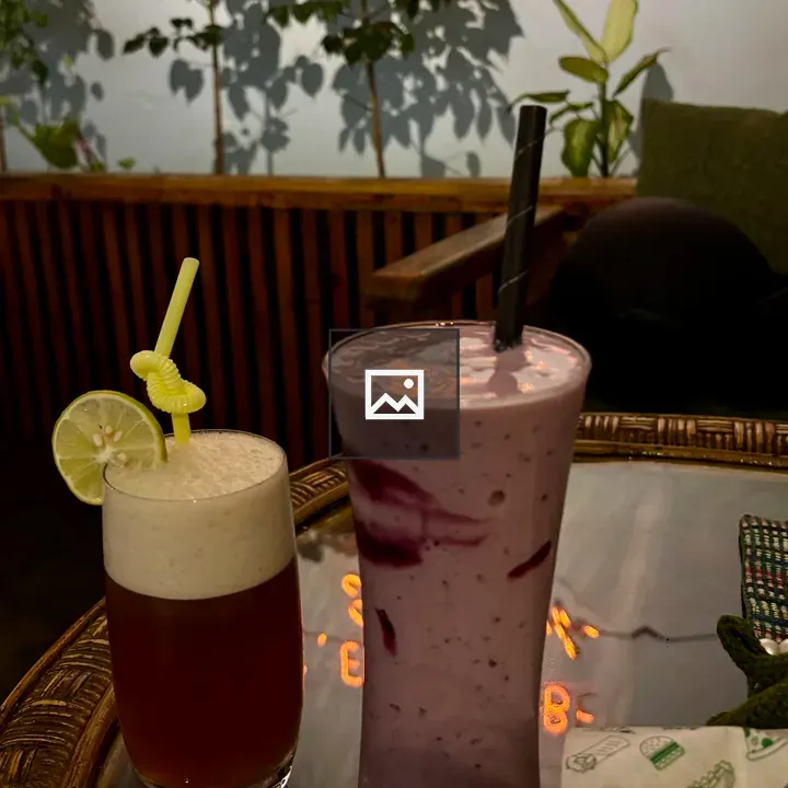 Two Beverages on Glass Table