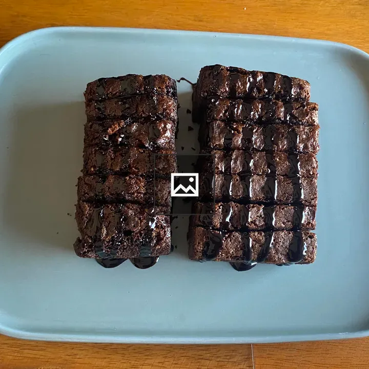 A light blue plate of brownies