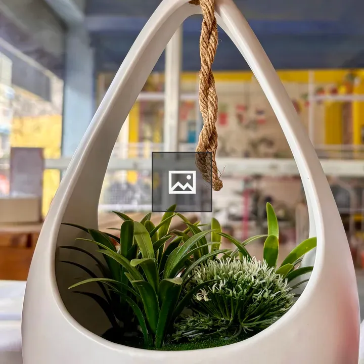Teardrop Planter with Green Plants
