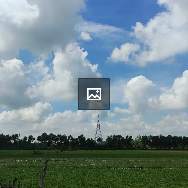 Power line over green field