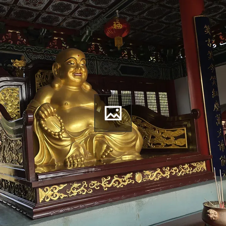 Golden seated statue