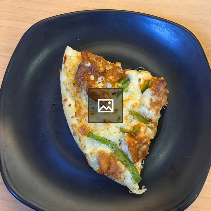 Slice of pizza on plate