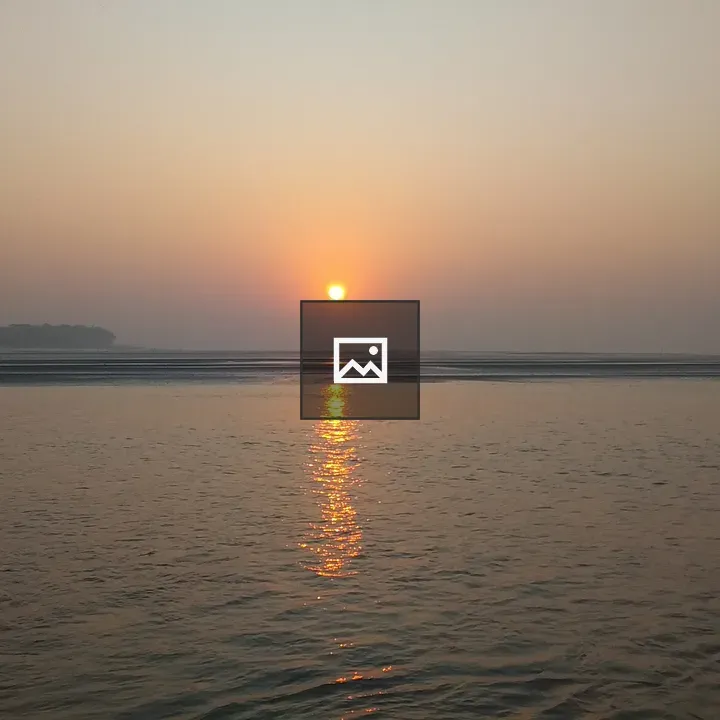 Sunset Over Calm Water