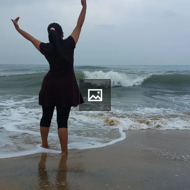 Girl dancing on the beach