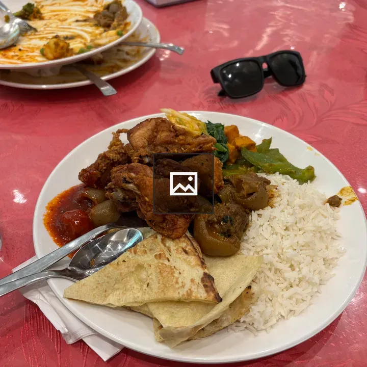 Plate with fried chicken and rice